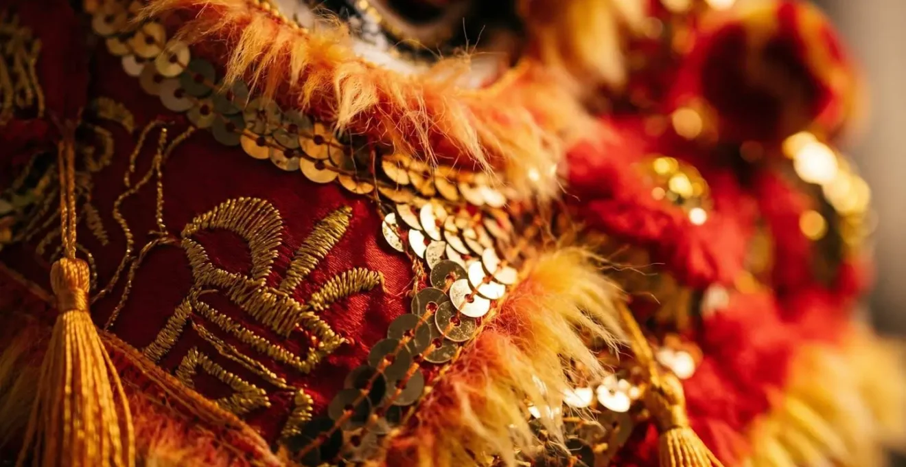 Extreme close-up of traditional lion dance costume showing intricate textures and vibrant colors